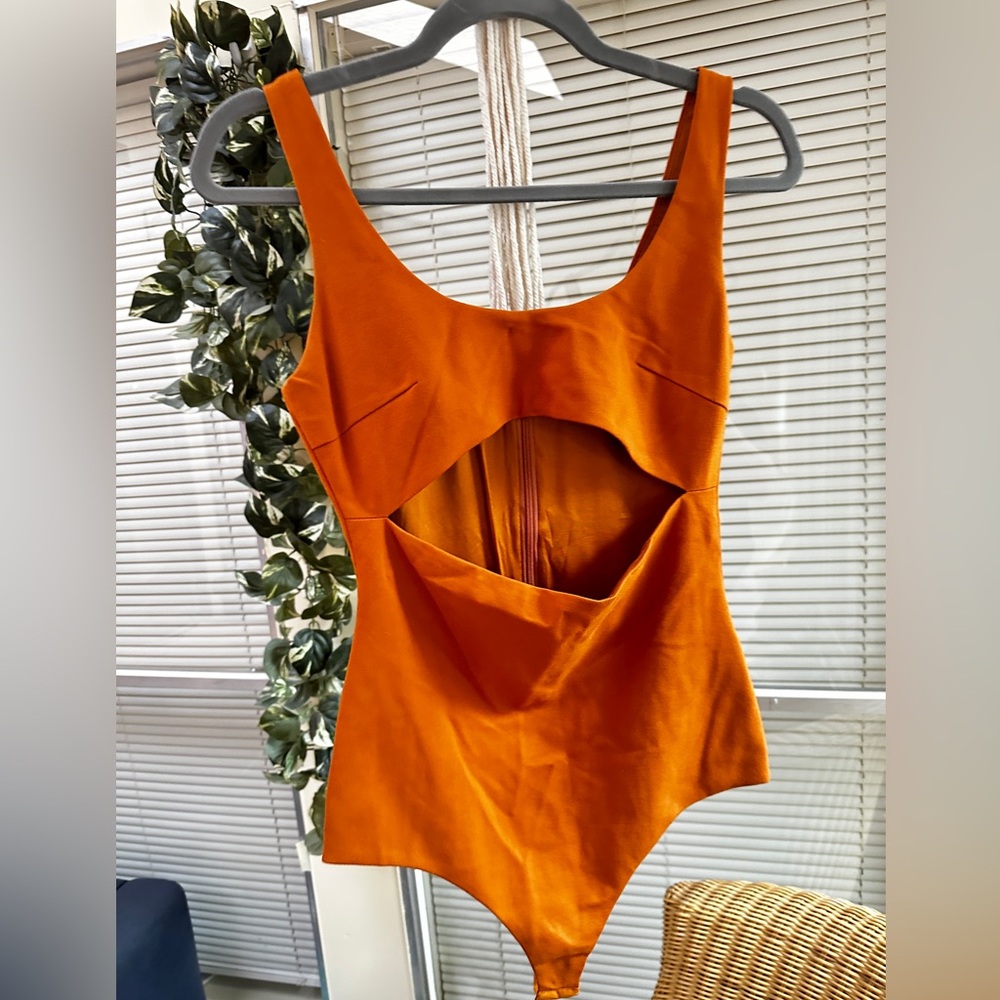 Miss Circle Body suit, Size Small.